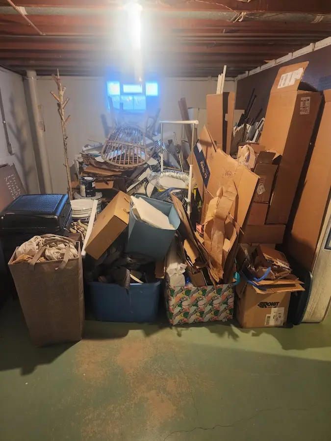 Roll-off dumpster container at job site for 2 Yard Dumpster Rental in Carlisle